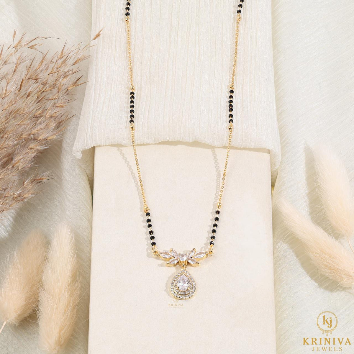 KRINIVA Crystal Bloom Mangalsutra for Women | Gold-Plated CZ Pendant with Black Beads