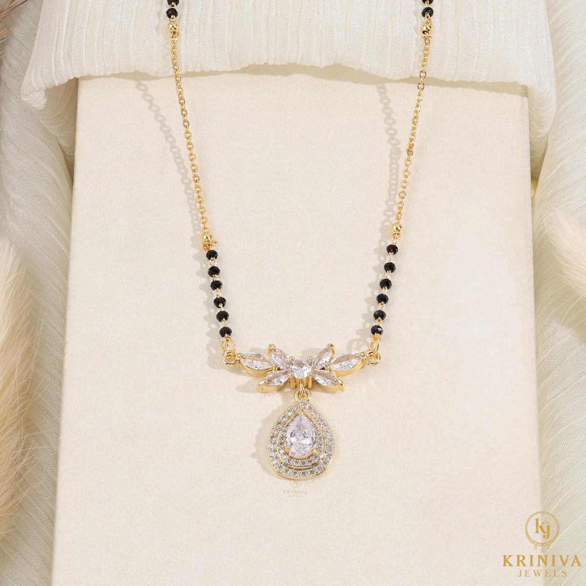 KRINIVA Crystal Bloom Mangalsutra for Women | Gold-Plated CZ Pendant with Black Beads